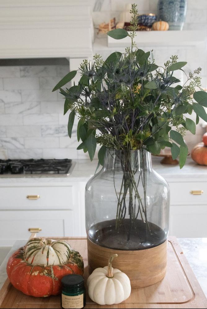 plant decor with pumpkins